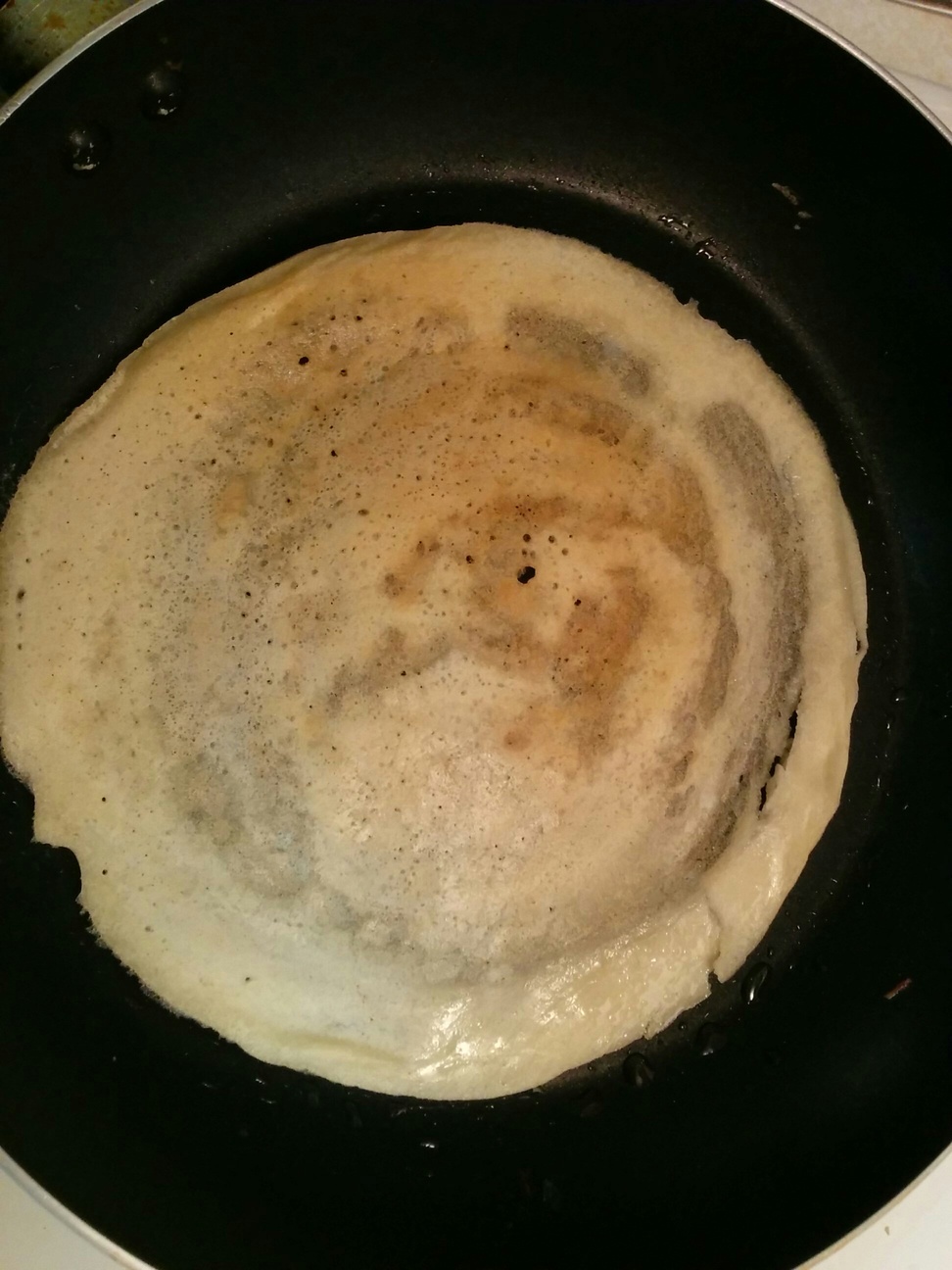Dosa making on a pan
