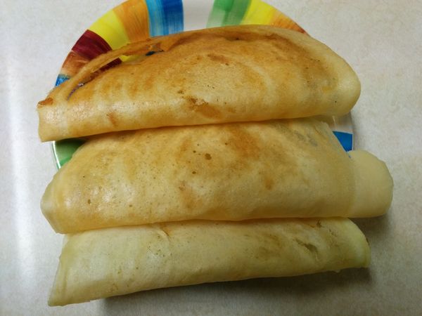 Preparing Masala Dosa (Indian Delicacy)